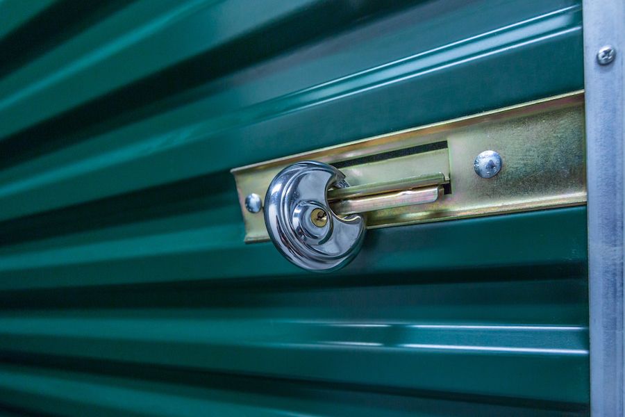 A lock on a door. 10 Home Security Tips to Stay Safe This Winter.